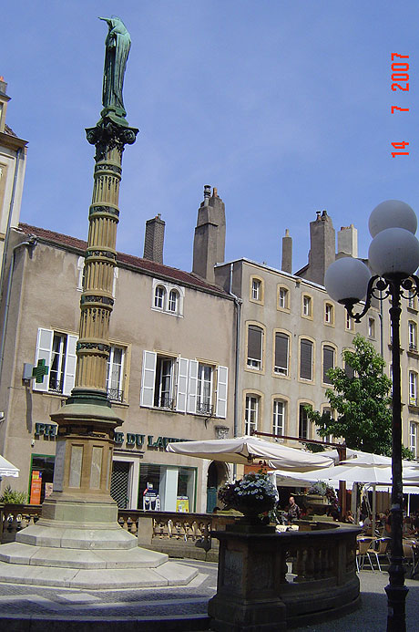 Column monument in metz city center square photo